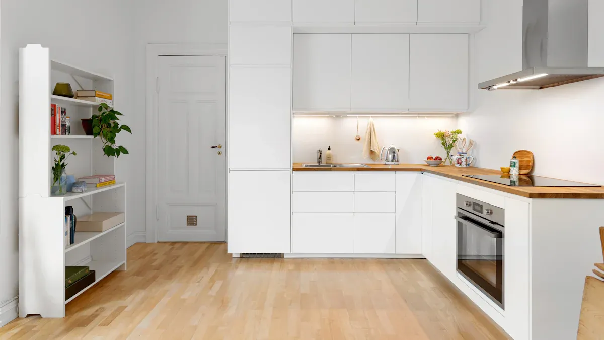 hardwood floor in kitchen with white cabinets 3